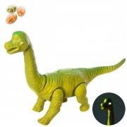 Игрушечный динозавр спроектором несёт яйца