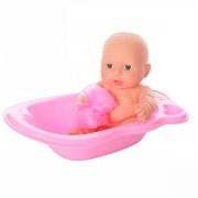 Іграшковий пупс в ванні з мочалкою